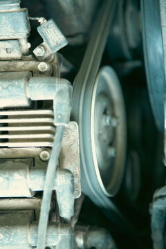 Detail of the engine of a vintage car. Shallow depth of field.