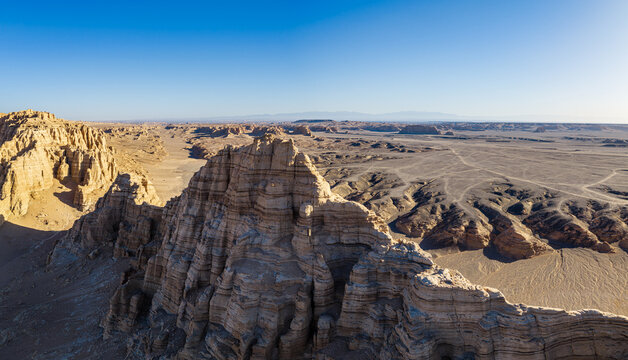 Aerial view of majestic yardang landforms and unique geological rock formations in the Gobi desert, Dahaidao, Xinjiang, China