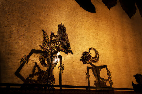 indonesian traditional shadow puppet performance on screen