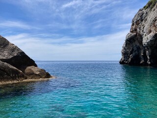 Obraz premium Turquoise and blue waters and rocky coastline on Lesbos, Greece
