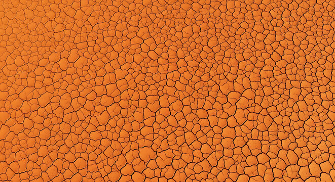 Cracked earth texture during a spooky Halloween night with a desolate arid feel