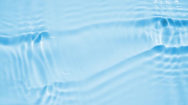 Abstract transparent water shadow surface texture natural ripple on blue background