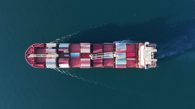 Cargo container Ship, cargo maritime ship with contrail in the ocean ship carrying container and running for export concept technology freight shipping sea freight by Express S