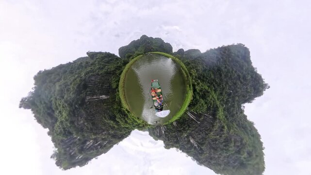 Asia, Ninh B&igrave;nh and Tam Coc 03,20,2026 Trang An in the Red River Delta region of Vietnam , Vietnamese boats transport tourists in limestone karst formations.  Unesco Heritage world  Halong Bay on Ear