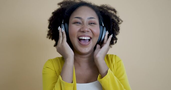 Portrait of beautiful  successful business African black girl in yellow suit celebrate with smartphone copy space on white background. Success and happy woman internet technology startup business. 