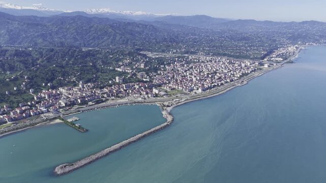 Aerial Drone Footage of Ardesen Town Center in Rize Turkey Featuring Black Sea Urban Landscape, Green Hills and Mountain Scenery