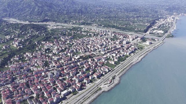 Aerial Drone Footage of Ardesen Town Center in Rize Turkey Featuring Black Sea Urban Landscape, Green Hills and Mountain Scenery