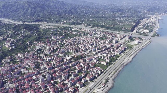 Aerial Drone Footage of Ardesen Town Center in Rize Turkey Featuring Black Sea Urban Landscape, Green Hills and Mountain Scenery