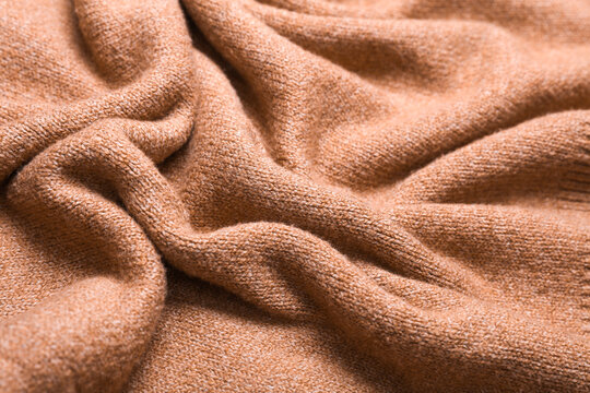 Wavy texture of beige cashmere sweater