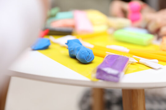 Mnay colored Plasticines on the table
