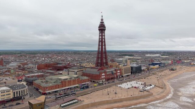 Aerial landscape view of Blackpool and Golden Mile Promenade in the holiday destination town in the Lancashire seaside resort of Blackpool, UK
