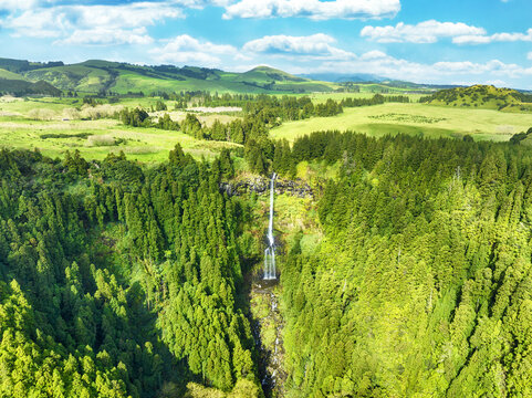 Green forest mountain panorama with hot waterfal and river of Ribeira, Sao Miguel Island, Azores, Portugal