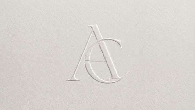Embossed AC monogram on textured cream paper, minimalist elegant serif initials in blind emboss style
