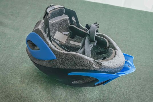 New bicycle helmet design placed on a green table for display and examination