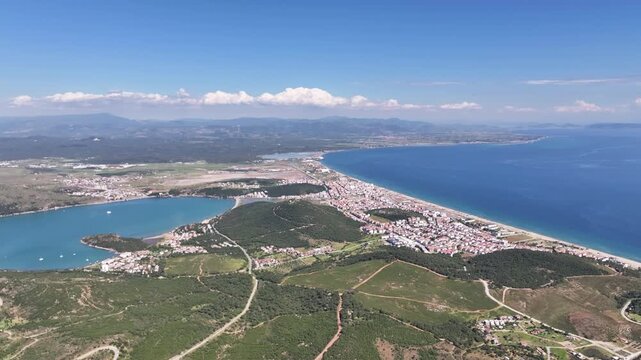 Stunning aerial footage of the beautiful coastline, islands, and turquoise sea in Ayvalik, Turkey, oe01