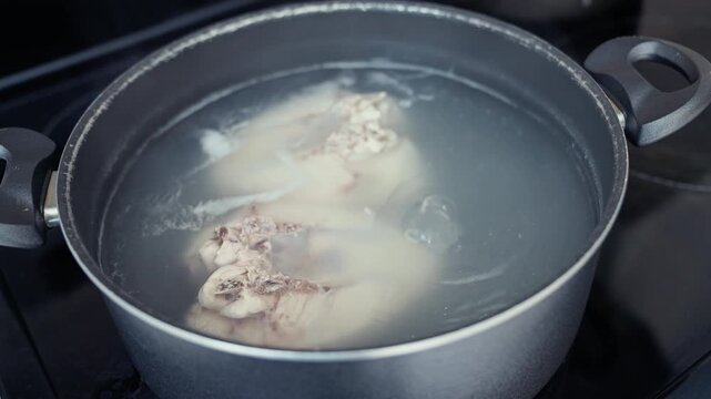 Boiling Chicken Breast in Pot.