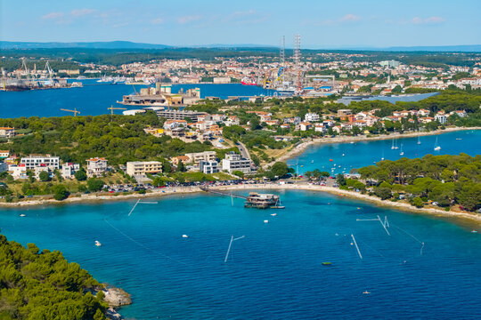 Drone aerial view of Pula harbor and Adriatic coastline in Croatia