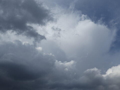 Sunlight Filtering Through Thick Storm Clouds