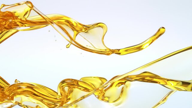 Super Slow Motion Shot of Splashing Oil Isolated on White at 1000fps.