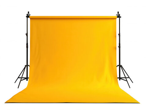 Empty professional yellow studio backdrop on adjustable metal tripod stands isolated on transparent background