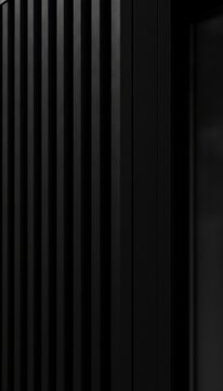 Close-up of Vertical Black Stripes on a Modern Architectural Surface