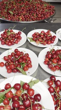 Elegant food presentation of fresh summer cherries on a table