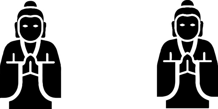 Two black silhouette Buddha statues in prayer pose.