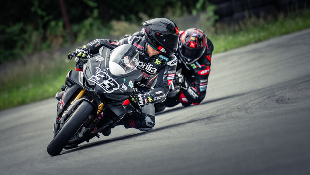 Regular training in Riga, Latvia, Bikernieki on 12-05-2026  Two motorcyclists racing on a paved track