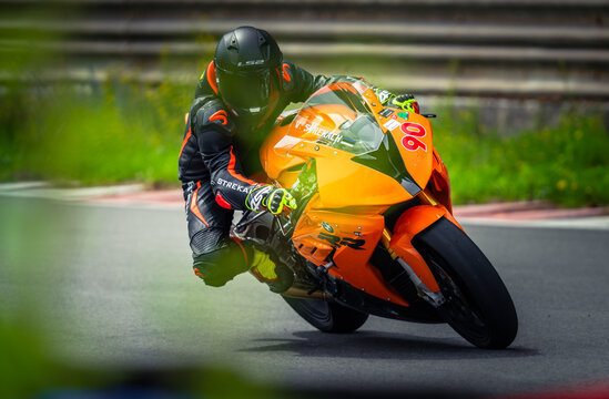 Regular training in Riga, Latvia, Bikernieki on 12-05-2026  Motorcyclist leaning into a turn on racetrack