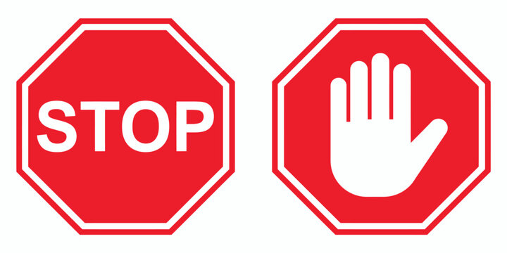 Red stop signs with white text and hand symbol on white background