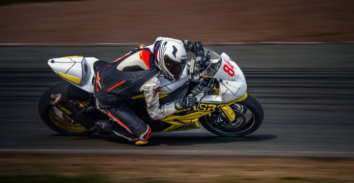 Regular training in Riga, Latvia, Bikernieki on 12-05-2026  Motorcyclist leaning into a turn on a racetrack