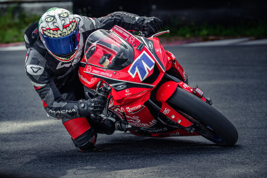 Regular training in Riga, Latvia, Bikernieki on 12-05-2026  Motorcycle racer leaning into a turn on track