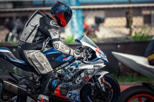 Regular training in Riga, Latvia, Bikernieki on 12-05-2026  Motocross rider in action on a decorated dirt bike