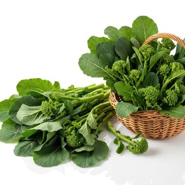Fresh green broccoli rabe vegetable in a wooden basket and lying on the table