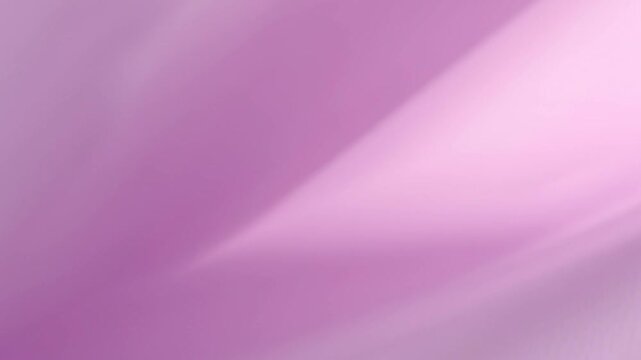 Slow pan across silk fabric flowing and shifting folds in studio close up backdrop with soft pink pastel tones