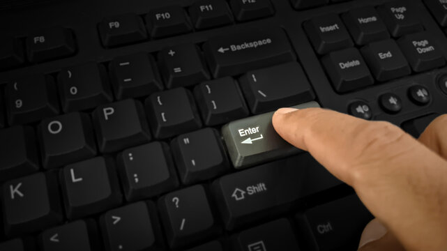 hand on keyboard to enter