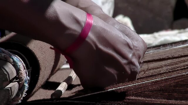 Traditional Textile Craftsmanship Hands Weaving Pattern On Wooden Loom - 4K
