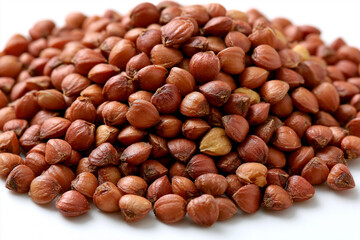Fototapeta premium Seeds placed in a pile on a plain surface