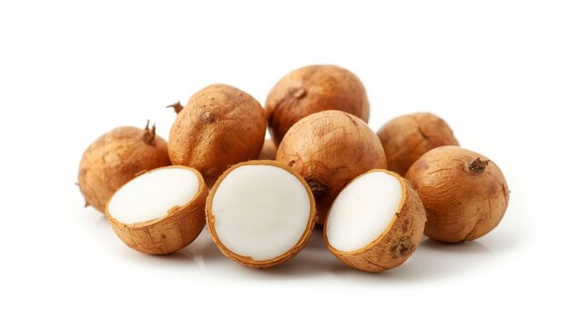 Clean water chestnuts, spherical brown corms with crunchy white interiors, set against a blank white backdrop.