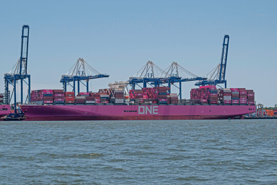 ONE Hawk, a Suezmax-class container vessel, with the ship-to-shore cranes of Wando Welch Terminal in Charleston Harbor, SC, USA, on July 03, 2026.