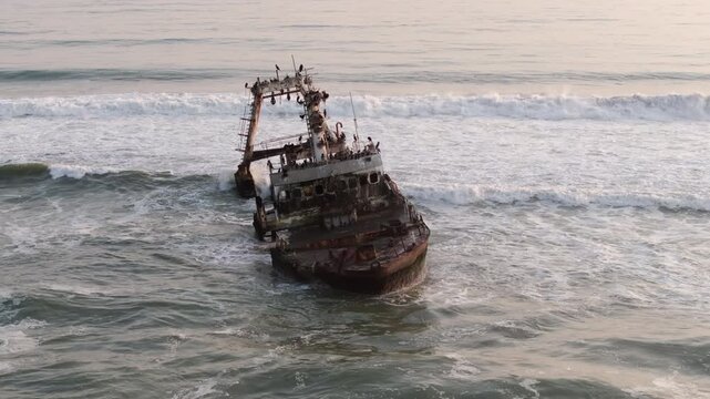 Aerial orbiting shot of the Zeila shipwreck on the Skeleton Coast in Namibia, southwest Africa.	