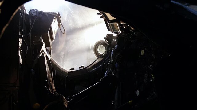 Interior View of Vintage Military Bomber Cockpit with Pilot Seat - 4K
