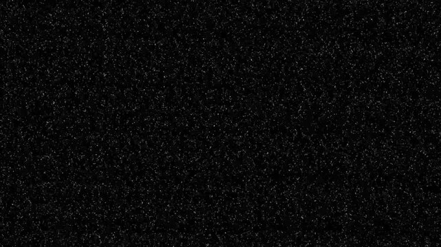 Fine grain noise texture with scattered white dots on a deep black background for cinematic overlays and digital visual effects production