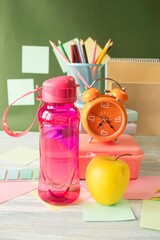 School supplies and healthy lunch on the table, back to school concept © Tetiana