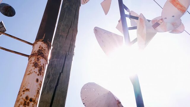 Handmade Wind Spinner Anemometer Rotating Against Bright Blue Sky Roadside - 4K