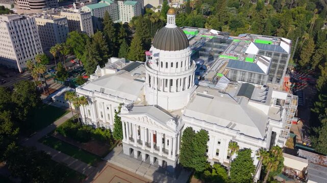 Aerial views show the west side of the California State Capitol. The new annex is under construction to the east of the building.