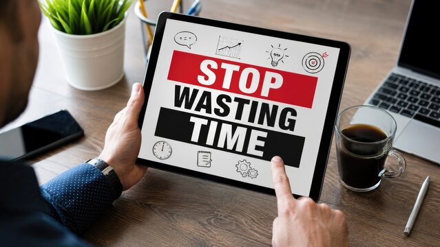 Stop Wasting Time Motivation Message Displayed on Digital Tablet for Productivity and Time Management