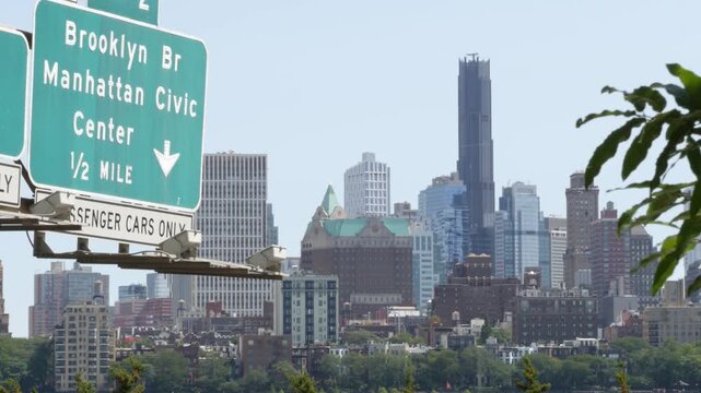 New York City Brooklyn Heights skyline from Manhattan, United States. Residential district near Dumbo and Brooklyn Bridge cityscape. Manhattan Civic Center road traffic sign. FDR Drive urban highway.