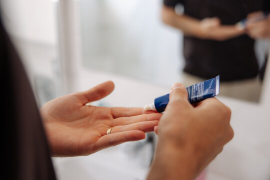 Man Applying Hand Cream 