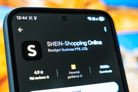 Warsaw, Poland - July 6, 2026: A smartphone displaying the SHEIN-Shopping Online app on its screen, highlighting the mobile shopping trend in contemporary retail.